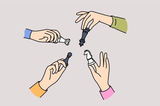 Chess in hands of people from opposing teams, as concept of strategic confrontation between rivals. Chess to develop strategic thinking and task planning skills to increase productivity