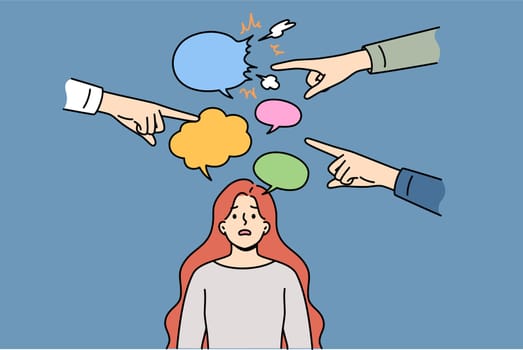 Women hear misogyny and discriminatory remarks from men pointing fingers at frustrated victim. Problem of misogyny based on gender stereotypes and infringement of rights of girls in workplace