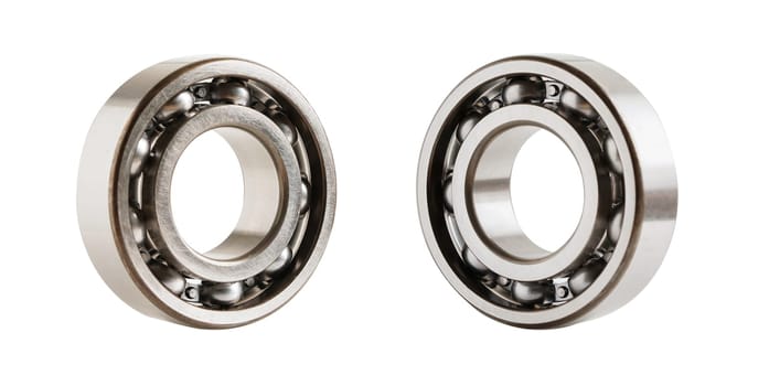 Bearing isolated on white background, mechanical engine component.