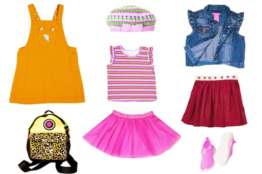 Collage set of little girl summer clothes isolated on white. Kids apparel collection. Childs fashion clothing outfit. Skirt, shorts, shirt, dresses, jeans, bag, sweater, shoes.