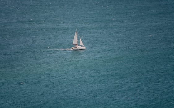 Sailboat sailing in lonely sea, San Juan del Sur