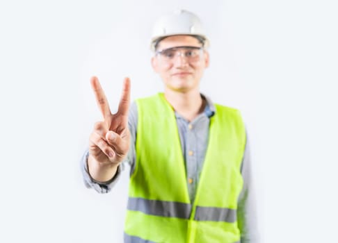 Young engineer counting number two isolated. Male engineer showing number two isolated