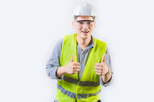 Positive young engineer showing ok gesture isolated. Handsome engineer gesturing ok approved isolated, smiling at camera