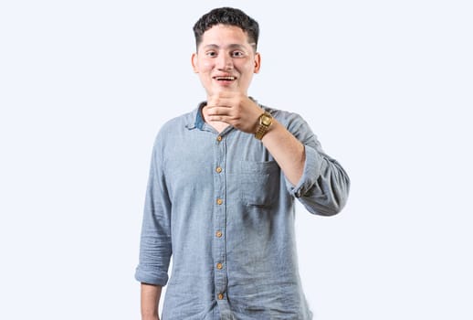 Person gesturing DRINK in sign language. Deaf and dumb person showing DRINK in sign language. Young man gesturing DRINK in sign language isolated
