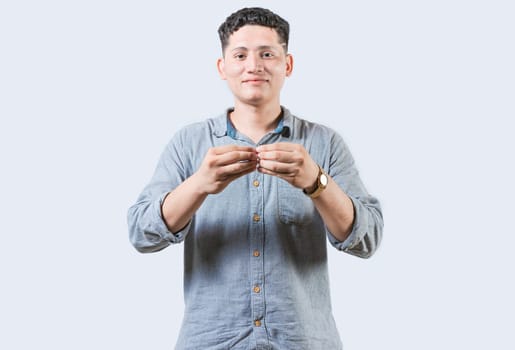 Person gesturing MORE in sign language isolated. Gesticulation of MORE in sign language. Deaf and dumb man gesturing MORE in sign language