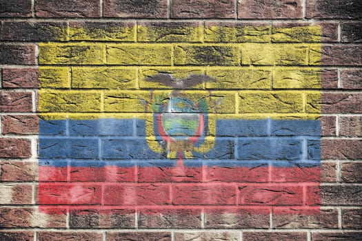 An Ecuador flag painted on brick wall background