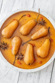 White wine spicy and sweet poached pears