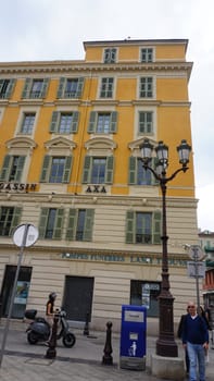 Nice, France - September 22, 2024: People going near beautiful architecture of Nice, south France