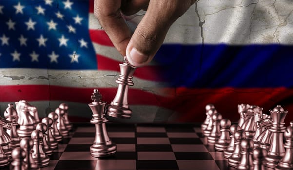 Political tension between Russia and USA. Russia vs USA flag on chessboard