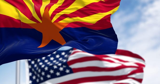 Flags of Arizona and United States waving in the wind on a clear day. Arizona is a state in the Southwestern US. 3d illustration render. Fluttering textile. Selective focus