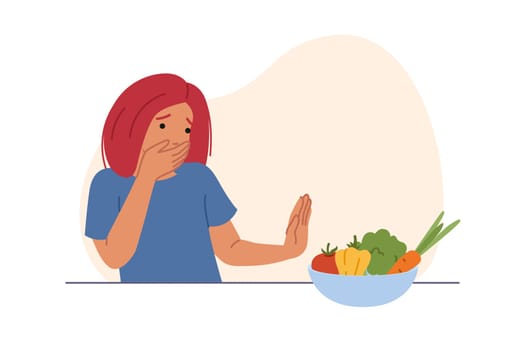 Teenage girl feels disgusted by fresh vegetables and does not want to eat plant ingredients. Young woman stands near table with vegetables in plate and experiences nausea or lack of appetite.