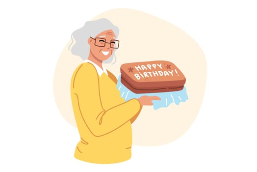 Birthday cake in hands of happy elderly woman celebrating centenary and rejoicing in congratulations from family. Grandma birthday ready to receive gifts and listen to compliments.
