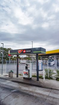 Budapest, Hungary - October 6, 2023: gas station with white MOL sign of Hungarian Oil and Gas Public Limited Company