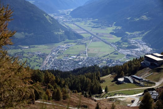 View from the Rosskopf with the middle station of the cable car to the hiking paradise in South Tyrol with the town of Vipiteno and the Wipptal