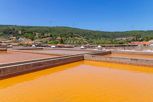 Rio Maior, Portugal: July 7, 2024: Fonte da Bica Salt Flats, aka Salinas de Rio Maior, system of shallow water compartments and gutters for salt extraction, Portugal