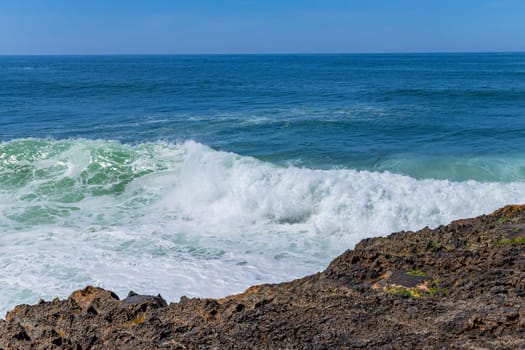 View of ocean waves and fantastic rocky coast in Ericeira, near Lisbon. Portugal