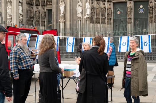 Israeli Palestinian protest in Cologne, Germany, 07.10.2024, war conflict between Jews and Muslims, remembering the victims and hostages of terror attack in Gaza