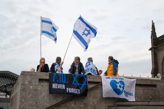 Israeli Palestinian protest in Cologne, Germany, 07.10.2024, war conflict between Jews and Muslims, remembering the victims and hostages of terror attack in Gaza