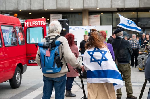 Israeli Palestinian protest in Cologne, Germany, 07.10.2024, war conflict between Jews and Muslims, remembering the victims and hostages of terror attack in Gaza