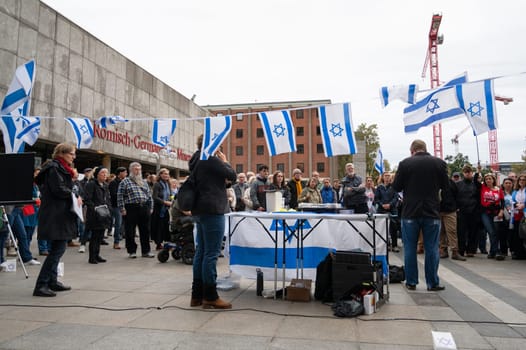 Israeli Palestinian protest in Cologne, Germany, 07.10.2024, war conflict between Jews and Muslims, remembering the victims and hostages of terror attack in Gaza