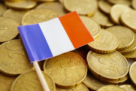 France flag on coin and banknote money, finance trading investment business currency.