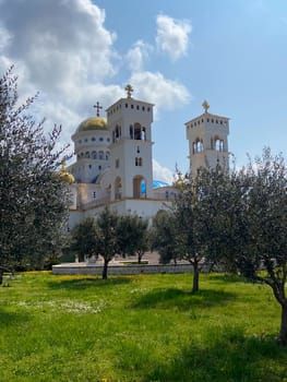 The Cathedral Church of Serbian Saint Jovan Vladimir is one of largest religious Orthodox buildings in Montenegro. Majestic snow-white temple with gilded domes and bells.