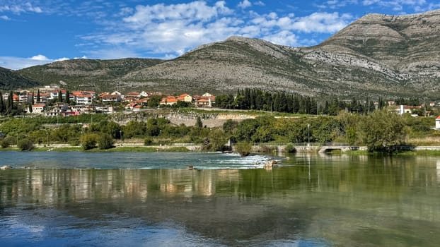 Cityscape from the Trebisnjica River.Trebinje, Bosnia and Herzegovina,October 2, 2024
