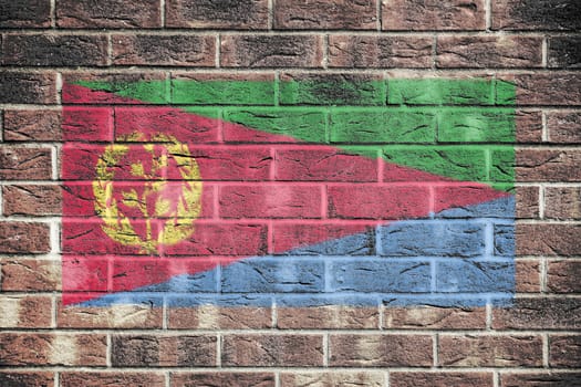 An Eritrea flag painted on brick wall background