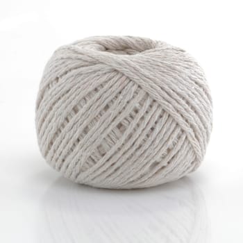 A ball of string on white