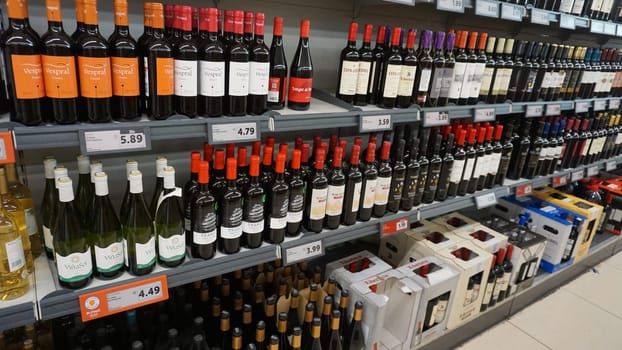Lloret de mar, Spain - September 30, 2024: Retail shelves and display cases in a hypermarket Lidl trademark is a big supermarket at Lloret de mar, Spain
