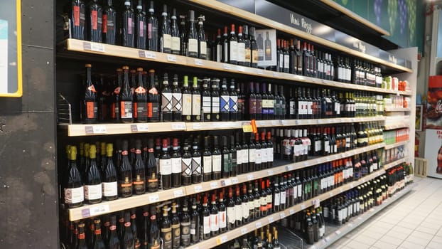 Lloret de mar, Spain - September 30, 2024: Retail shelves and display cases in a hypermarket Lidl trademark is a big supermarket at Lloret de mar, Spain