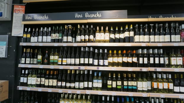 Lloret de mar, Spain - September 30, 2024: Retail shelves and display cases in a hypermarket Lidl trademark is a big supermarket at Lloret de mar, Spain