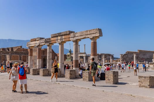 Pompeii, Italy - August 8, 2024: Ruins of a city. Pompeii is an ancient Roman city died from the eruption of Mount Vesuvius in 79 AD.