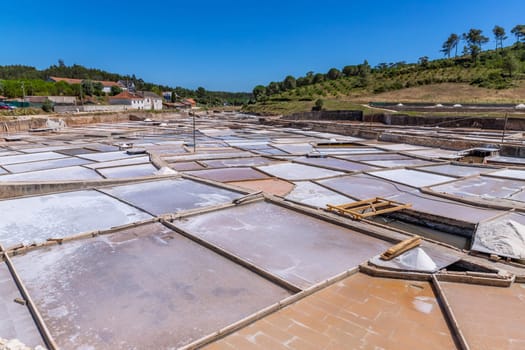 Rio Maior, Portugal: July 7, 2024: Fonte da Bica Salt Flats, aka Salinas de Rio Maior, system of shallow water compartments and gutters for salt extraction, Portugal