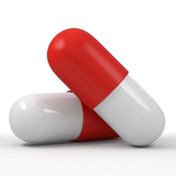 White and red pills isolated on white background. Close up macro shot. Medication, healthcare insurance, pharmacy concept.