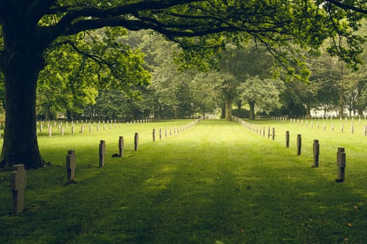 Bastogne, Belgium - July 17 2021: Panoramic view on graves at the German war cemetery in Bastogne, most of the buried died during the Battle of The Bulge in the Ardennes