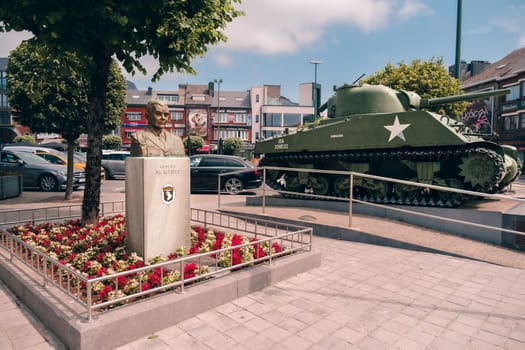 Bastogne, Belgium - July 17 2021: McAuliffe Square with the General "Nuts!"" McAuliffe Memorial and the M4 Sherman Tank Memorial remembering the Battle of the Bulge.."