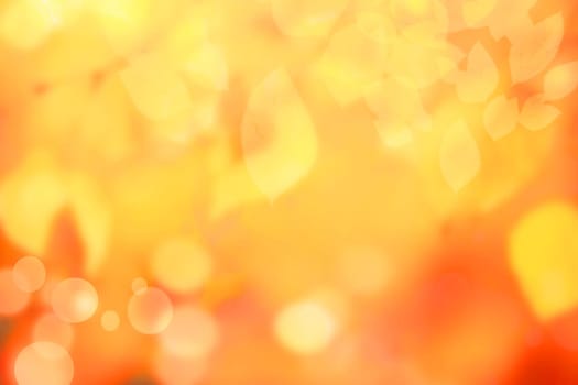 Hello autumn background. Abstract autumn gradient gold yellow orange bright background texture with leaves and bokeh circles. Indian summer. Card design with space text. Beautiful backdrop.