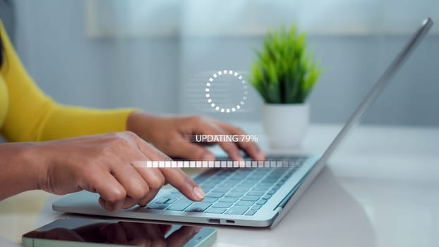 Woman working and installing update process, Update software application technology concept, Software update or operating system upgrade, Updating progress bar on computer screen. Installing app patch