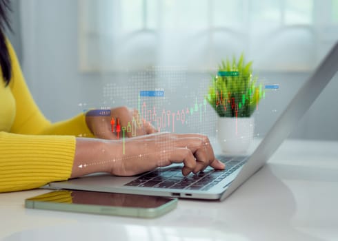 Businesswoman is showing a growing virtual hologram of analytics dashboard with charts, Stock market, Business growth, Progress or success concept, Invest in trading, Finance, Sales, Marketing.