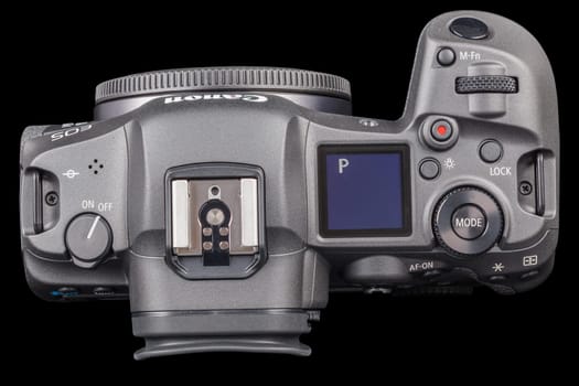 Canon R5 - black professional 35mm full-frame mirrorless camera body with flip screen isolated on black background with focus stacking - Tula, Russia, September 15, 2021