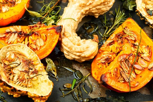 Delicious baked or butternut squash pumpkin with herbs.