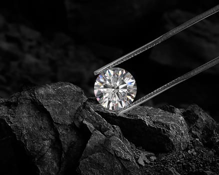 Cut Beautiful diamond held by tweezers on black coal background