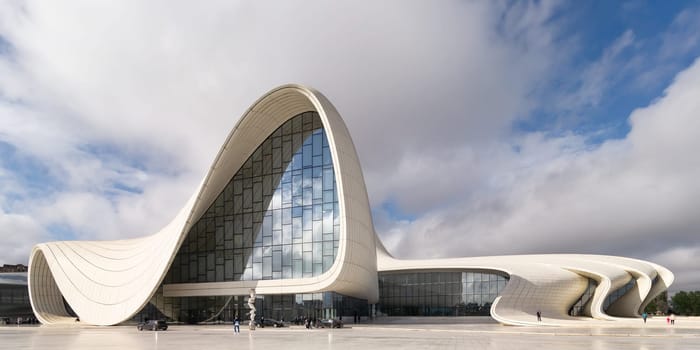 Baku, Azerbaijan - May 7, 2024: The iconic Heydar Aliyev Centre, exemplifies modern architecture with its fluid, wave-like design