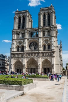 FRANCE, PARIS - JUNE 01: Tourists enjoy sightseeing near the Cathedral of Notre Dame in Paris on June 01, 2015
