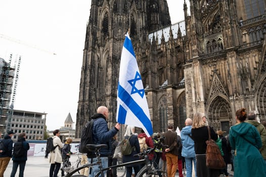 Israeli Palestinian protest in Cologne, Germany, 07.10.2024, war conflict between Jews and Muslims, remembering the victims and hostages of terror attack in Gaza