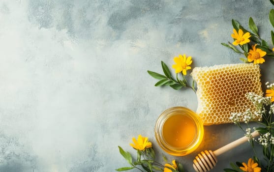 Fresh honey in a jar with honeycomb and yellow wildflowers on a light blue background, showcasing natural sweetness and organic products.