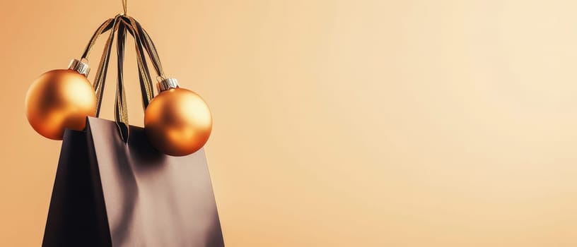 Black gift bag adorned with golden ornaments, set against a warm background, ideal for holiday branding.