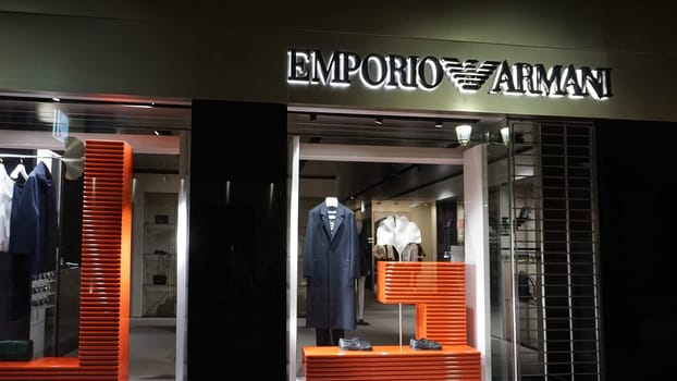 Nice, France - September 22, 2024: Emporio Armani store sign, An Italian luxury fashion house founded in Milan. Retails haute couture and ready-to-wear.