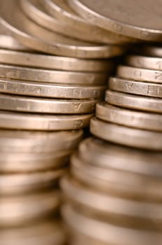 Large pile of big golden coins. Financial success money background for rich life concepts, banking and profit in Ukraine